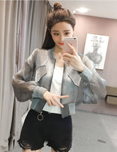 Chaqueta básica fina de lúrex transparente y suelta